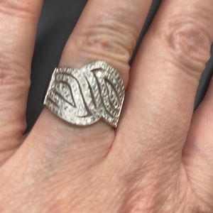 This is 925 sterling silver ring of all clear stones not diamonds.